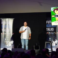 Dr Victor Gallegos Rejas performing on stage